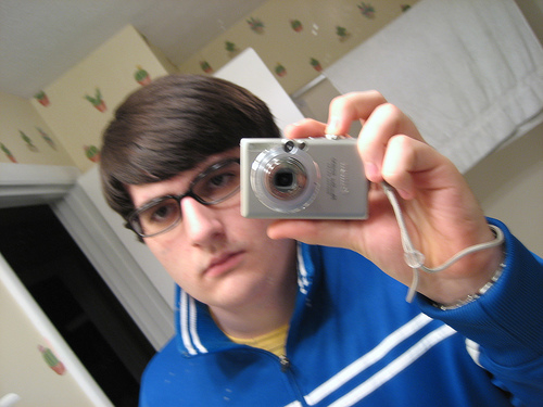 My new glasses in MySpace fashion.